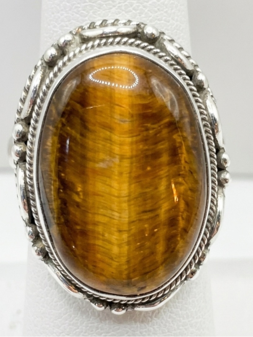 Oval Cabochon Tiger's Eye Gemstone Set In A Sterling Silver Setting Size 5